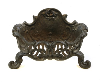 Lot 673 - A cast iron fire grate