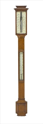Lot 903 - An oak stick barometer