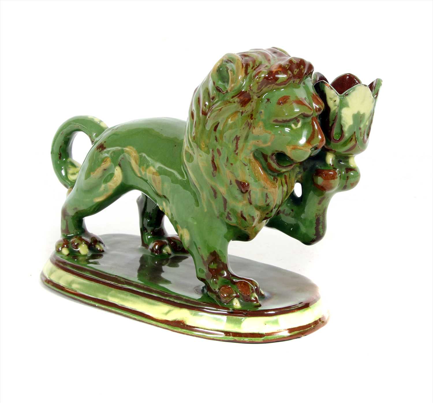 Lot 136 - A CH Brannam pottery chamberstick