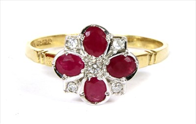 Lot 89 - An 18ct gold ruby and diamond quatrefoil cluster ring