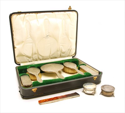 Lot 72 - A cased silver backed brush set