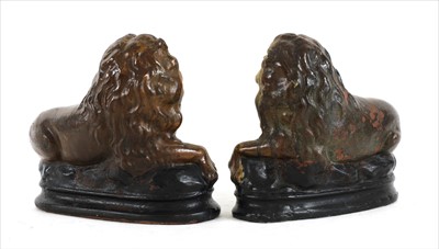 Lot 771 - A pair of moulded terracotta figures of lions