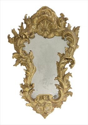 Lot 682 - A carved wood and gesso wall mirror
