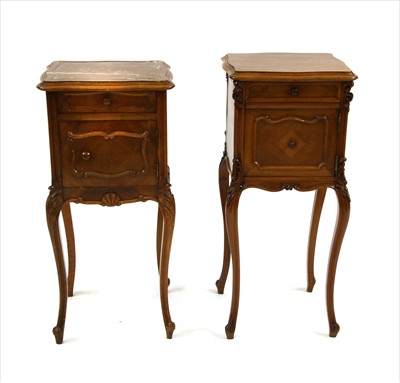 Lot 648 - Two French walnut bedside cabinets