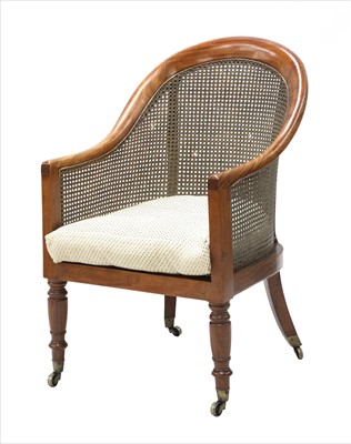 Lot 837 - A Regency mahogany bergère chair
