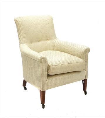 Lot 405 - A cream upholstered low arm chair