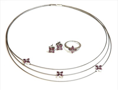 Lot 262 - An 18ct white gold diamond and pink sapphire 'flower press' necklace, ring and earrings suite