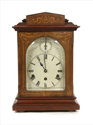 Lot 451 - An inlaid mahogany mantel clock