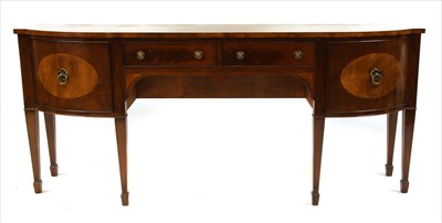 Lot 752 - A large George III style mahogany bowfront sideboard