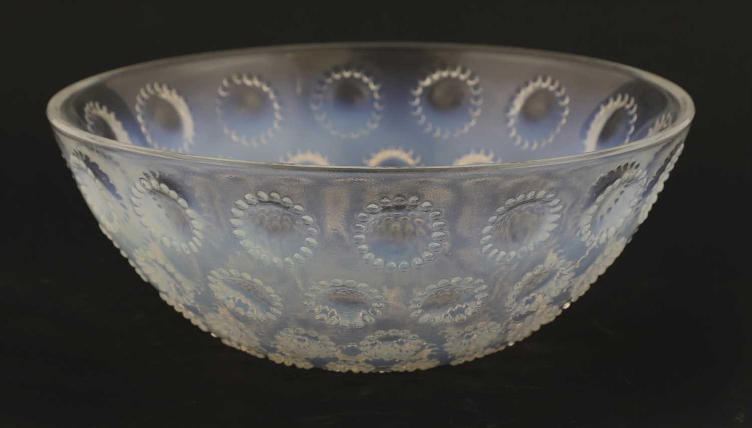 Lot 209 - A Lalique opalescent glass 'Asters' bowl