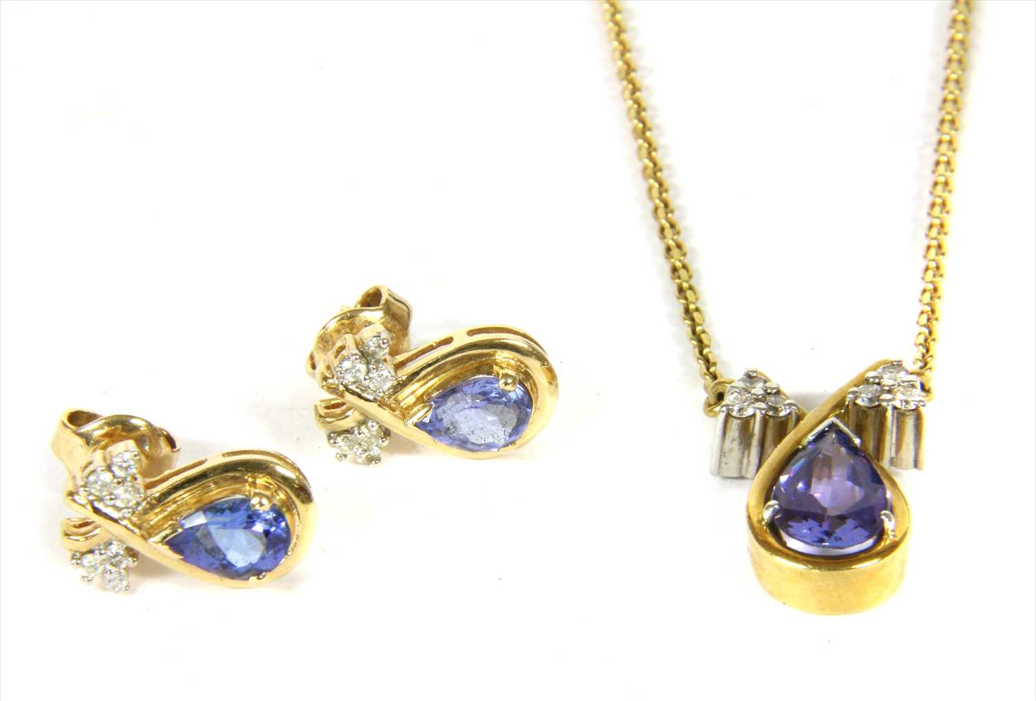 Lot 92 - An 18ct gold tanzanite and diamond necklace