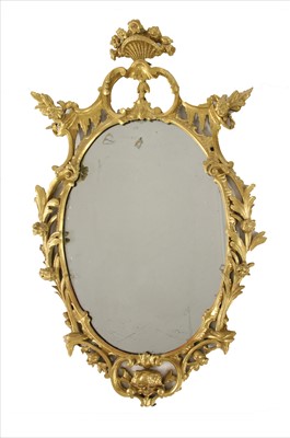 Lot 920 - An oval giltwood wall mirror