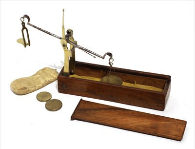 Lot 1043 - A brass and steel equal arm pull-out scale