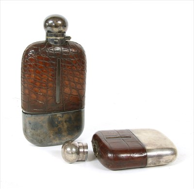 Lot 207 - A silver and leather spirit flask