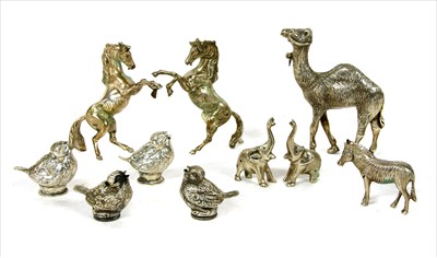 Lot 209 - A collection of Egyptian silver modelled animals