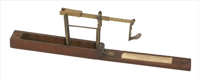 Lot 1056 - A rosewood cased brass folding coin scale