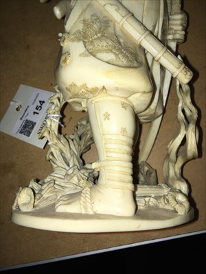 Lot 154 - A Japanese ivory okimono