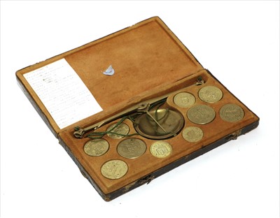 Lot 1067 - A tooled gilt leather cased Italian coin balance