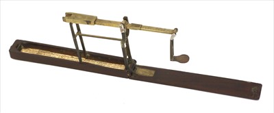 Lot 1077 - A rosewood cased brass folding coin scale