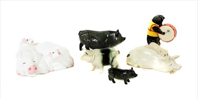 Lot 437 - A collection of Beswick and Royal Doulton modelled pigs