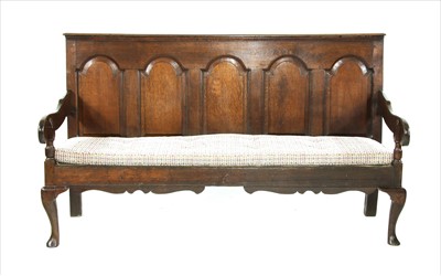 Lot 715 - An 18th century oak settle