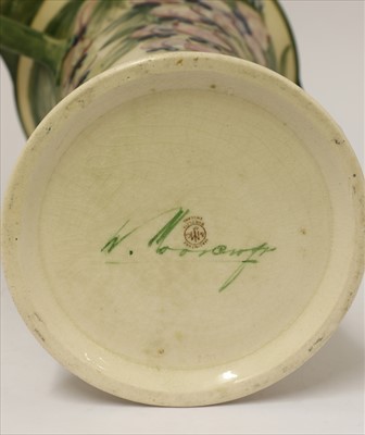 Lot 54 - A William Moorcroft Macintyre twin-handled 'Wisteria' vase