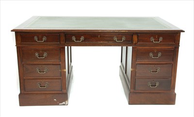 Lot 708 - A reproduction mahogany twin pedestal desk