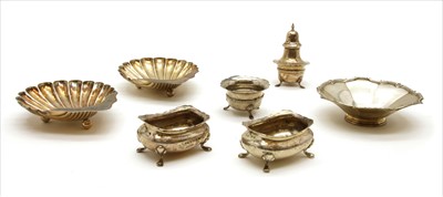Lot 215 - A near pair of silver shell form sweet meat dishes