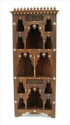 Lot 758 - A Syrian hardwood standing corner cupboard