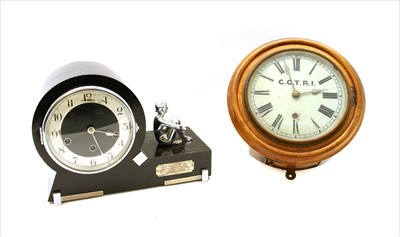 Lot 462 - An Art Deco ebonised mantel clock