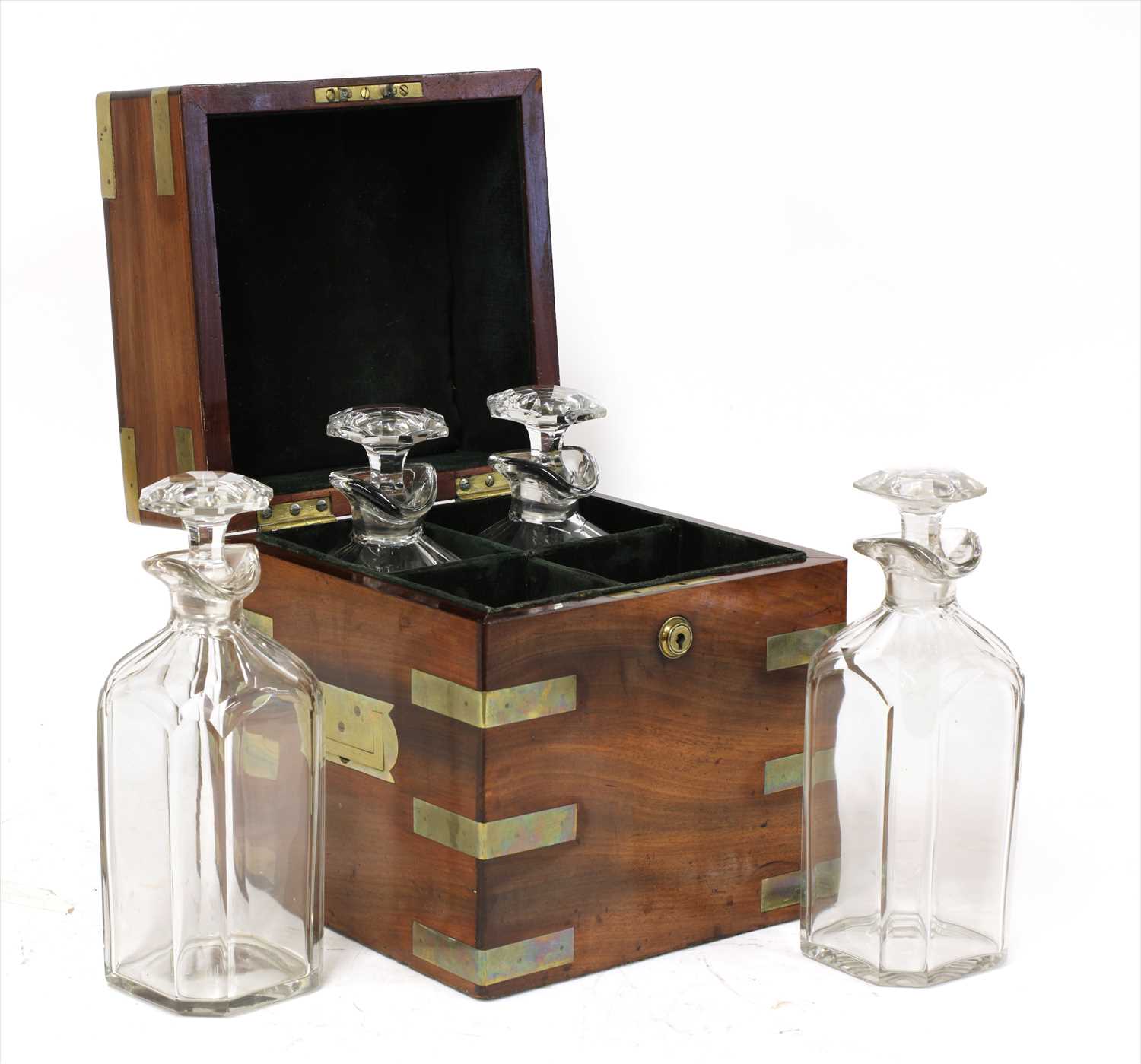 Lot 101 - A mahogany and brass-bound four-bottle decanter box