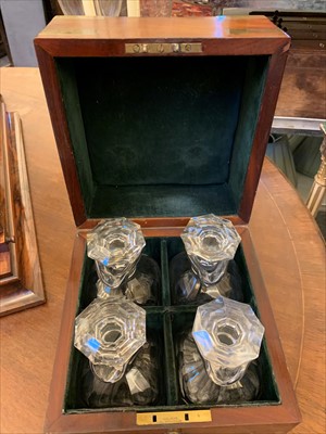 Lot 101 - A mahogany and brass-bound four-bottle decanter box
