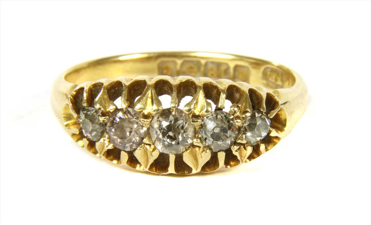 Lot 1 - An 18ct gold boat shaped five stone diamond ring