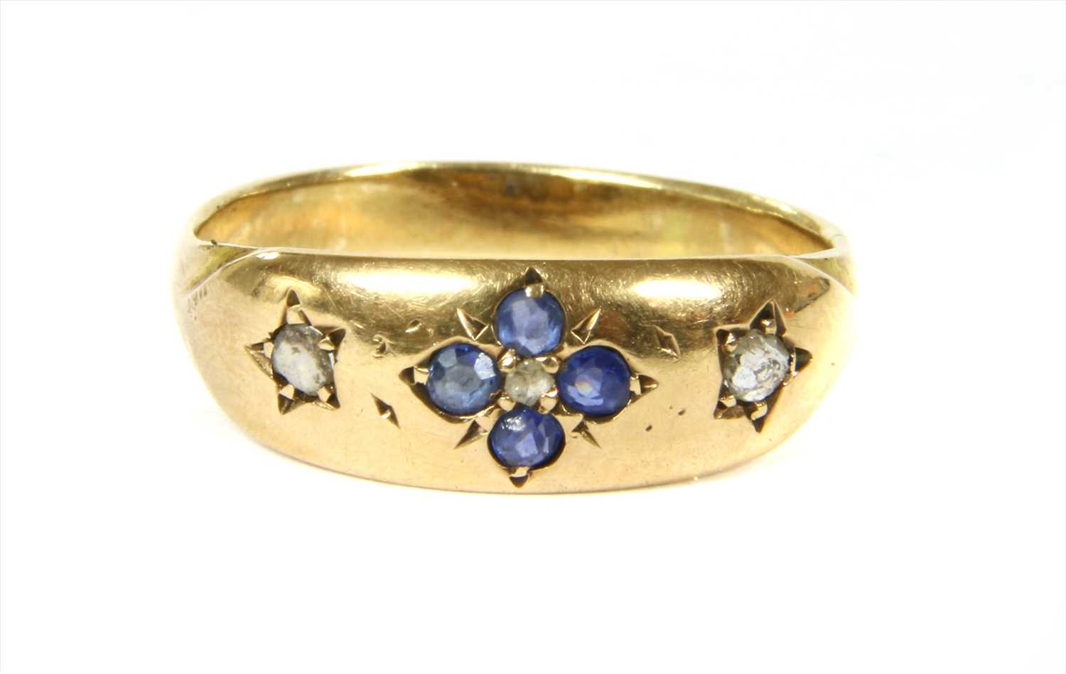 Lot 7 - A 15ct gold sapphire and diamond ring