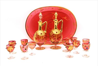 Lot 410 - A Venetian Cranberry glass liqueur set