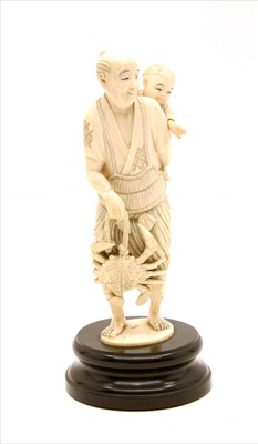 Lot 415 - A Japanese Meiji period ivory okimono