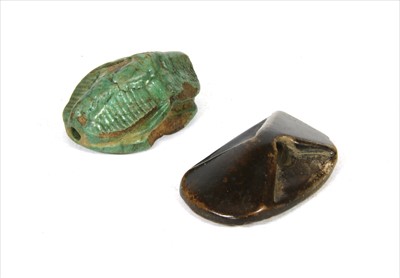 Lot 233 - An ancient Egyptian faience scarab bead
