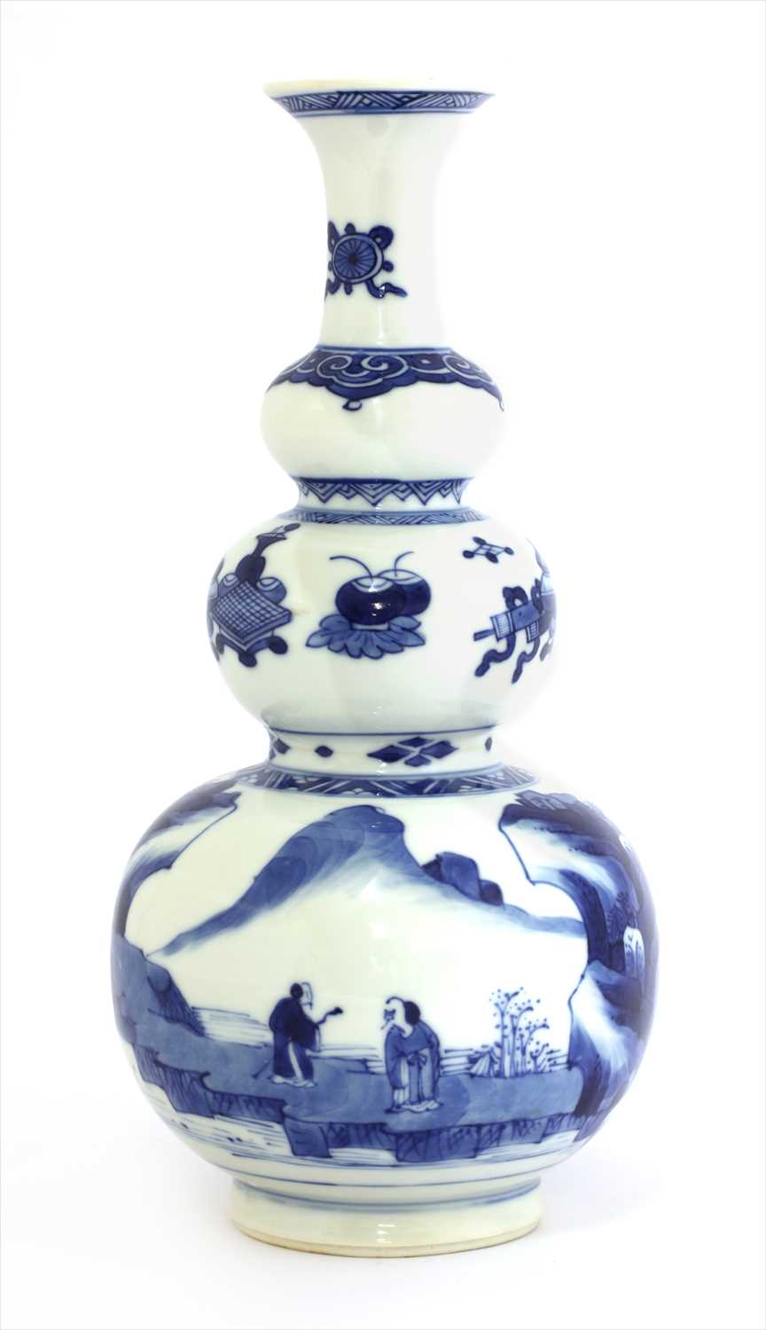 Lot 7 - A Chinese blue and white triple gourd vase
