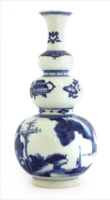 Lot 7 - A Chinese blue and white triple gourd vase