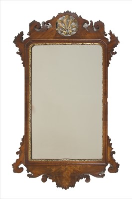 Lot 831 - A George III and later mahogany and giltwood fretwork wall mirror