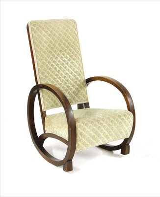 Lot 139 - An Art Deco oak rocking chair