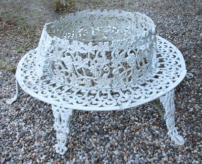 Lot 115 - A modern painted metal tree seat