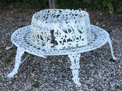 Lot 115 - A modern painted metal tree seat
