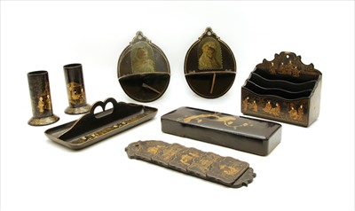 Lot 473 - A collection of lacquered papier-mâché wares