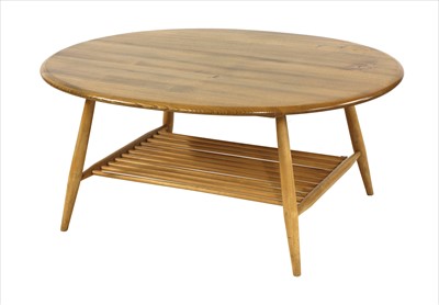 Lot 288 - An Ercol oval coffee table
