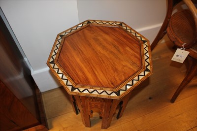Lot 67 - An octagonal inlaid and mother-of-pearl lamp table