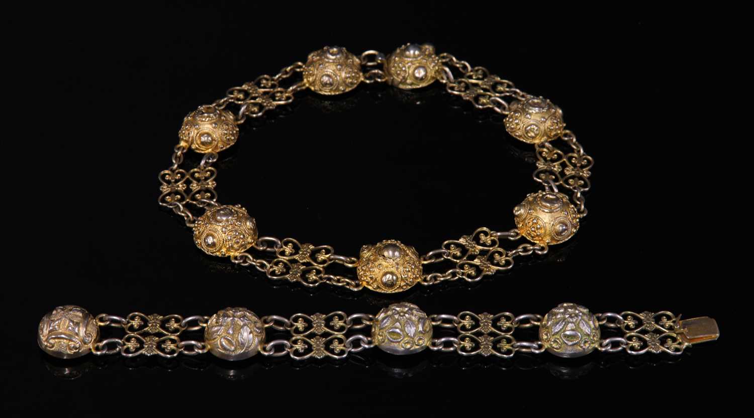 Lot 12 - A Victorian silver gilt necklace and bracelet suite