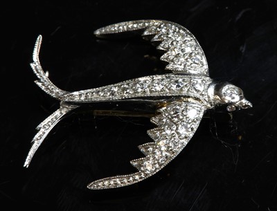 Lot 90 - A diamond set swallow brooch, c.1915