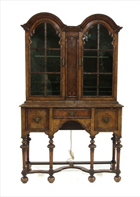 Lot 418 - A Queen Anne style walnut display cabinet