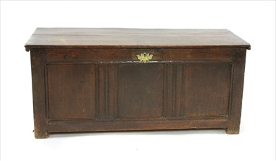 Lot 474 - A 17th century oak coffer with three panel front